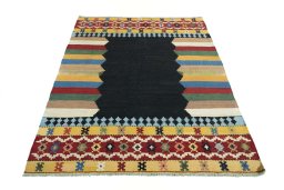 Close-up detail of New Kilim Sofre rug from Iran / Persia showing Wool weave