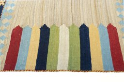 Close-up detail of New Kilim Sofre rug from Iran / Persia showing Wool weave