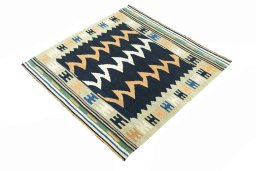 Corner detail of New Kilim Sofre rug showing border pattern and Wool pile