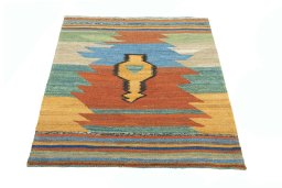 Close-up detail of New Kilim Sofre rug from Iran / Persia showing Wool weave