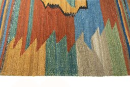 Close-up detail of New Kilim Sofre rug from Iran / Persia showing Wool weave