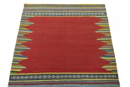 Close-up detail of New Kilim Sofre rug from Iran / Persia showing Wool weave