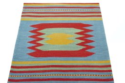 Close-up detail of New Kilim Sofre rug from Iran / Persia showing Wool weave