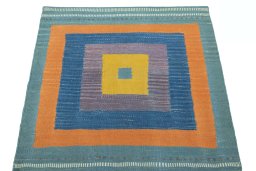 Close-up detail of New Kilim Sofre rug from Iran / Persia showing Wool weave