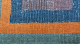 Close-up detail of New Kilim Sofre rug from Iran / Persia showing Wool weave