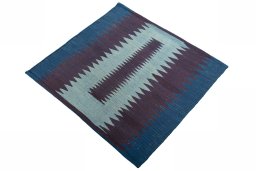 Corner detail of New Kilim Sofre rug showing border pattern and Wool pile