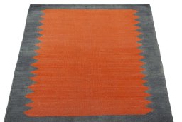Close-up detail of New Kilim Sofre rug from Iran / Persia showing Wool weave