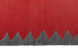 Close-up detail of New Kilim Sofre rug from Iran / Persia showing Wool weave