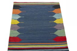 Close-up detail of New Kilim Sofre rug from Iran / Persia showing Wool weave