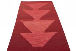 Close-up detail of New Kilim Sofre rug from Iran / Persia showing Wool weave
