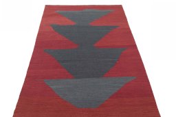 Close-up detail of New Kilim Sofre rug from Iran / Persia showing Wool weave