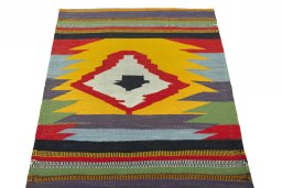 Close-up detail of New Kilim Sofre rug from Iran / Persia showing Wool weave