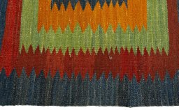 Close-up detail of New Kilim Sofre rug from Turkey showing Wool weave