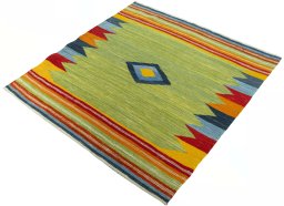 Corner detail of New Kilim Sofre rug showing border pattern and Wool pile
