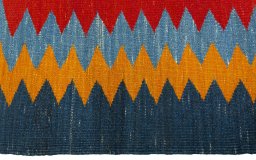 Close-up detail of New Kilim Sofre rug from Turkey showing Wool weave
