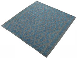 Corner detail of New Kilim Sofre rug showing border pattern and Wool pile