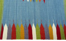 Close-up detail of New Kilim Sofre rug from Turkey showing Wool weave
