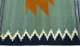 Close-up detail of New Kilim Sofre rug from Turkey showing Wool weave