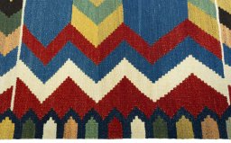 Close-up detail of New Kilim Sofre rug from Turkey showing Wool weave