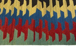 Close-up detail of New Kilim Sofre rug from Turkey showing Wool weave