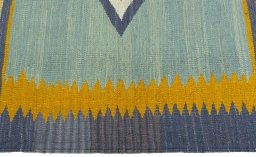 Close-up detail of New Kilim Sofre rug from Turkey showing Wool weave