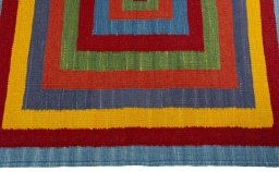 Close-up detail of New Kilim Sofre rug from Turkey showing Wool weave