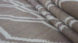 Close-up detail of New Modern Design rug from Iran / Persia showing Wool weave