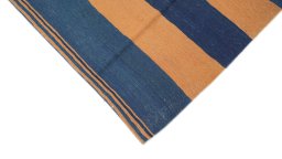 Backside of handmade 1990s Modern Design rug showing knot structure and weave density