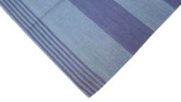 Backside of handmade 1990s Modern Design rug showing knot structure and weave density