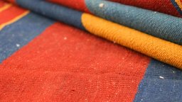 Close-up detail of New Modern Design rug from Iran / Persia showing Wool weave