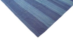 Backside of handmade New Modern Design rug showing knot structure and weave density