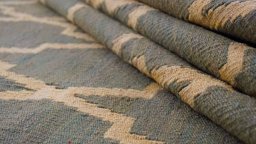Close-up detail of New Modern Design rug from Iran / Persia showing Wool weave