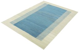 Corner detail of New Modern Design rug showing border pattern and Wool pile