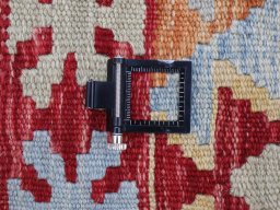 Corner detail of New Modern Design rug showing border pattern and Wool pile
