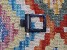 Corner detail of New Modern Design rug showing border pattern and Wool pile