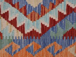 Backside of handmade New Modern Design rug showing knot structure and weave density