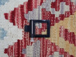 Corner detail of New Modern Design rug showing border pattern and Wool pile