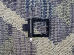 Corner detail of New Modern Design rug showing border pattern and Wool pile