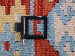 Corner detail of New Modern Design rug showing border pattern and Wool pile
