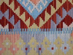 Backside of handmade New Modern Design rug showing knot structure and weave density