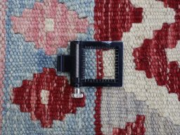 Corner detail of New Modern Design rug showing border pattern and Wool pile
