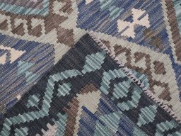 Surface texture of New Modern Design rug with natural Wool and intricate pattern