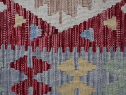 Backside of handmade New Modern Design rug showing knot structure and weave density