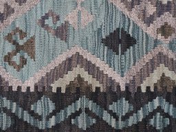 Backside of handmade New Modern Design rug showing knot structure and weave density