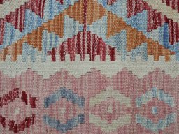 Backside of handmade New Modern Design rug showing knot structure and weave density