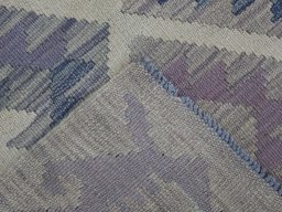 Surface texture of New Modern Design rug with natural Wool and intricate pattern