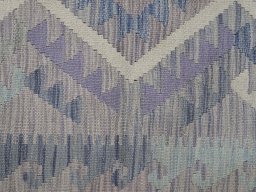 Backside of handmade New Modern Design rug showing knot structure and weave density