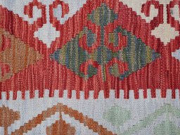 Backside of handmade New Modern Design rug showing knot structure and weave density