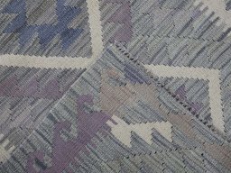Surface texture of New Modern Design rug with natural Wool and intricate pattern