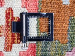 Corner detail of New Modern Design rug showing border pattern and Wool pile